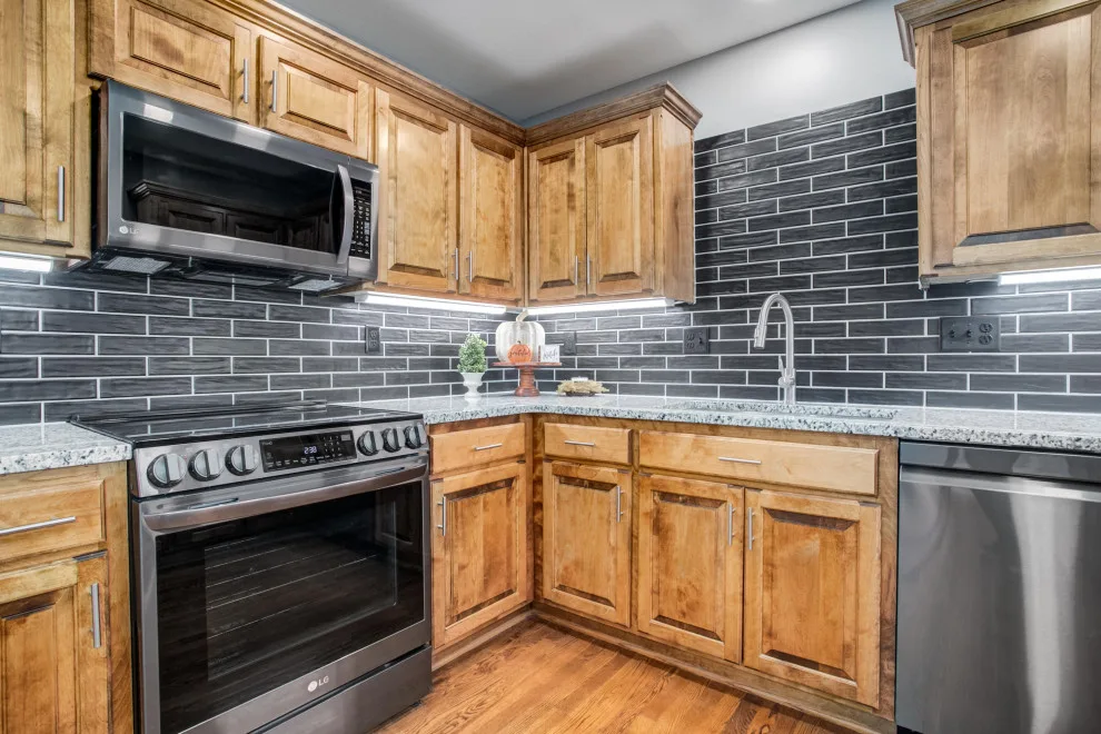 Sugar Creek Kitchen Renovation and Basement Completion by Top Shelf Home Builders - Photo 14