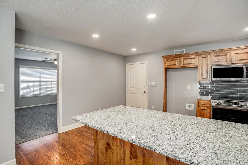 Sugar Creek Kitchen Renovation and Basement Completion by Top Shelf Home Builders - Photo 9