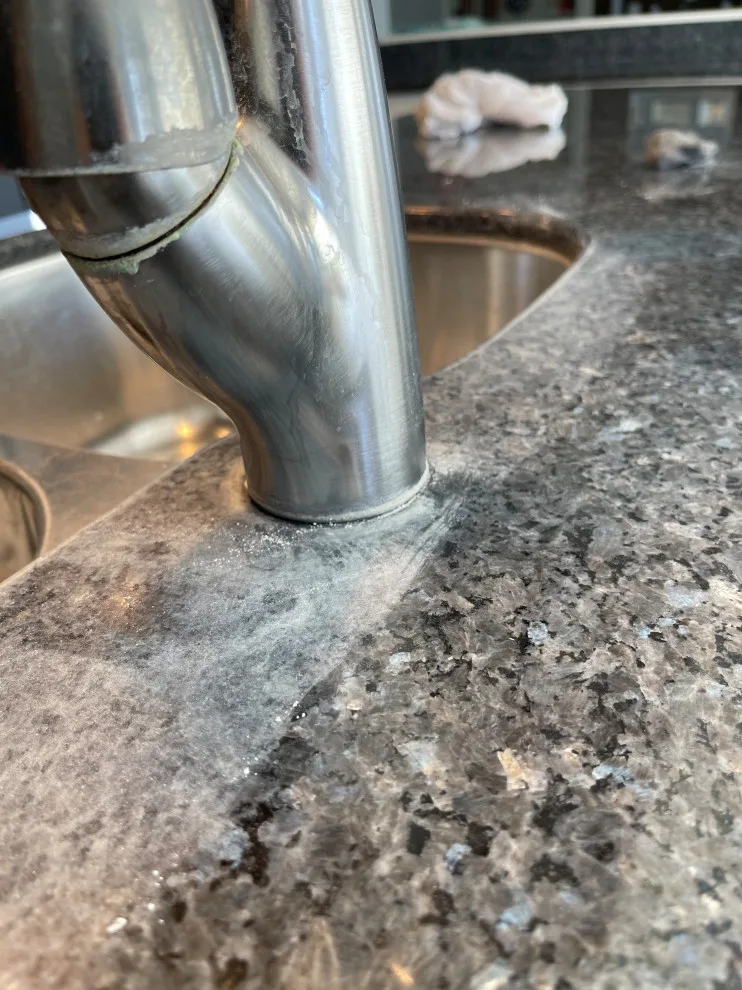 Granite countertop mineral deposit extraction by The Beautiful Stone Company - Photo 2