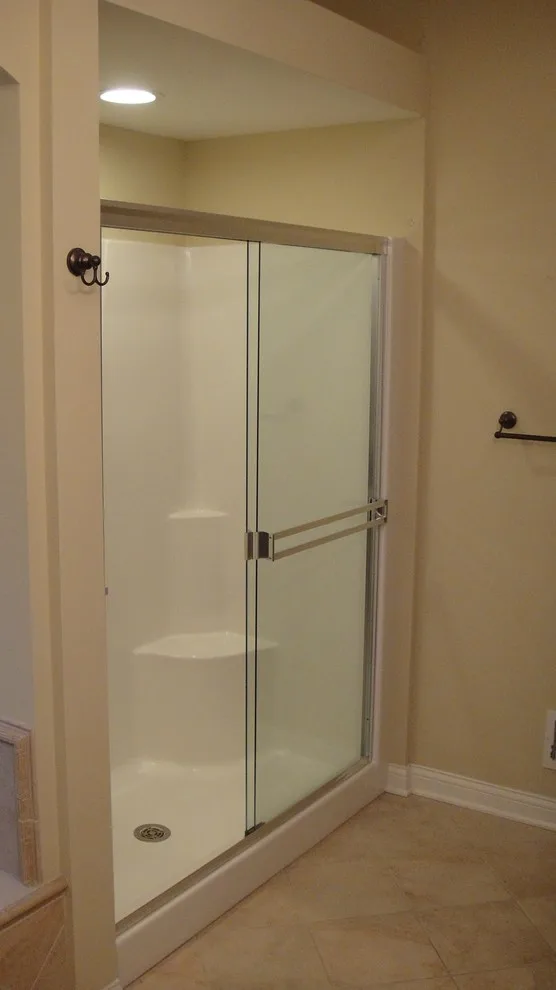 Showers: The Transformation by Heinrichs Custom Tile And Stone - Photo 11