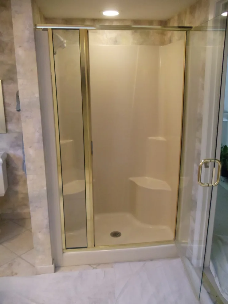 Showers: The Transformation by Heinrichs Custom Tile And Stone - Photo 9