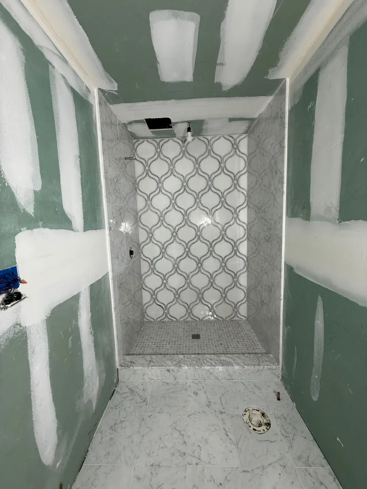 Restroom by DBA D Lopez Tile And Marble Works - Photo 25