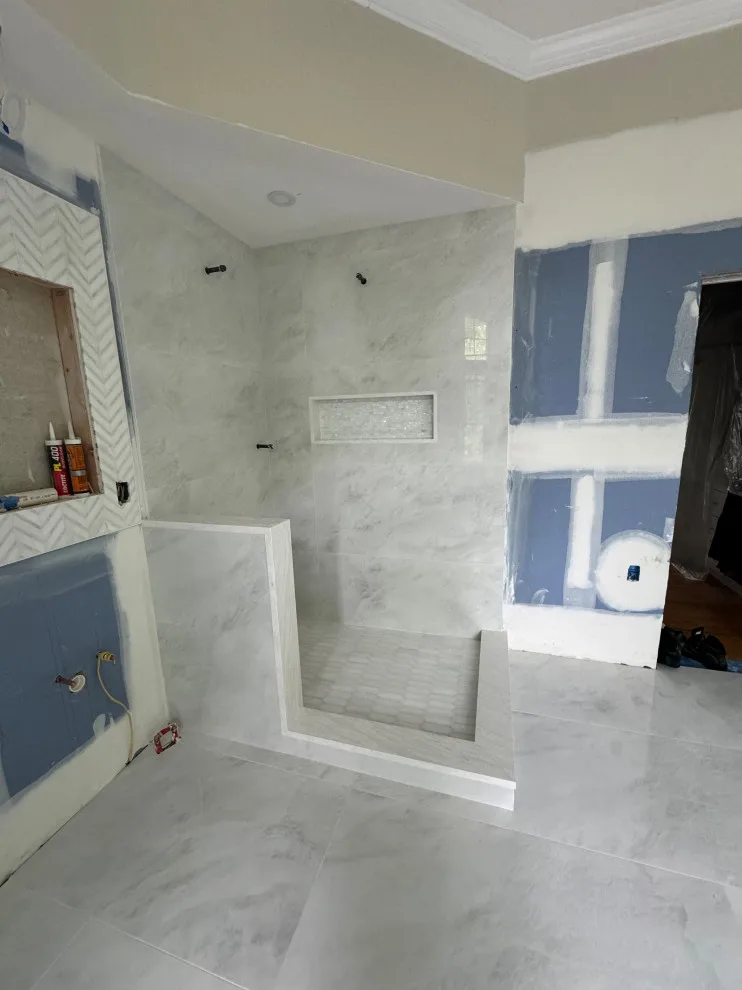 Restroom by DBA D Lopez Tile And Marble Works - Photo 12