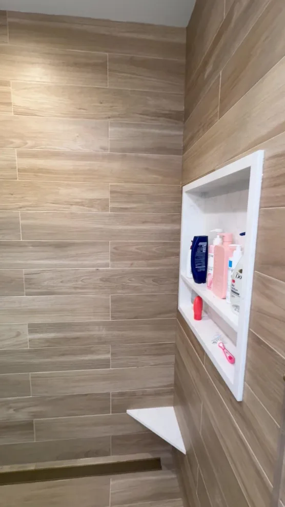 Restrooms by DBA D Lopez Tile And Marble Works - Photo 8