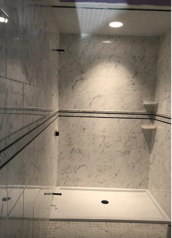 Restrooms by DBA D Lopez Tile And Marble Works - Photo 19