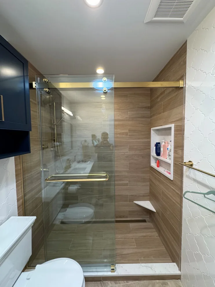 Restrooms by DBA D Lopez Tile And Marble Works - Photo 25