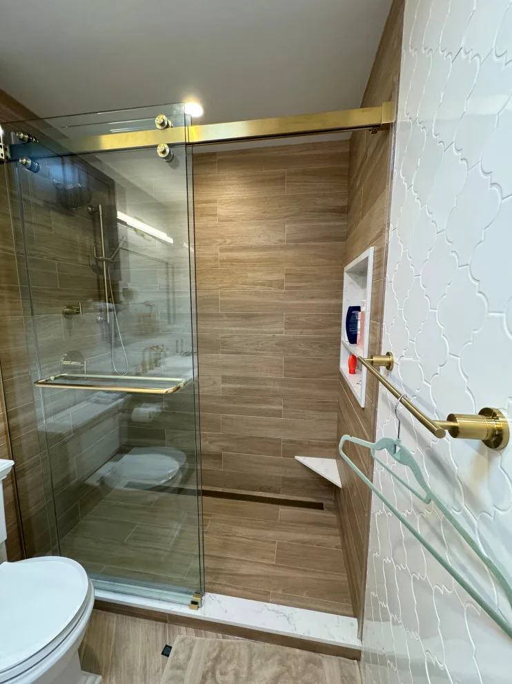 Restrooms by DBA D Lopez Tile And Marble Works - Photo 30