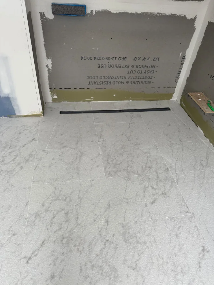 Restrooms by DBA D Lopez Tile And Marble Works - Photo 35