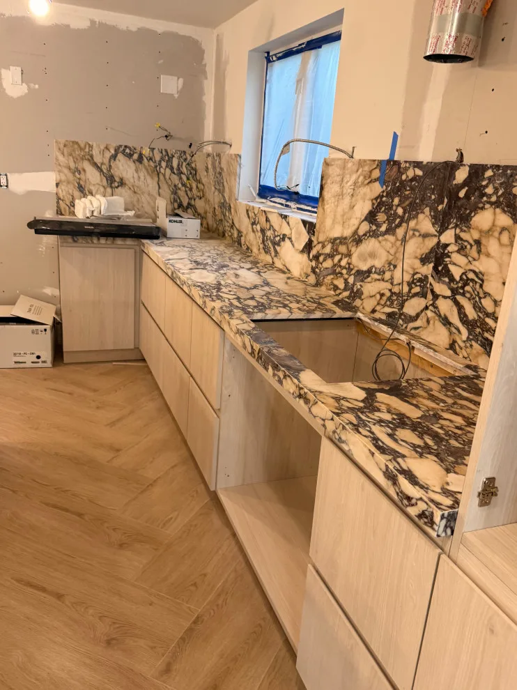 Stone Surfaces: Our Completed Projects with Granite, Marble, Quartz, and Onyx by Florida Granite - Photo 11
