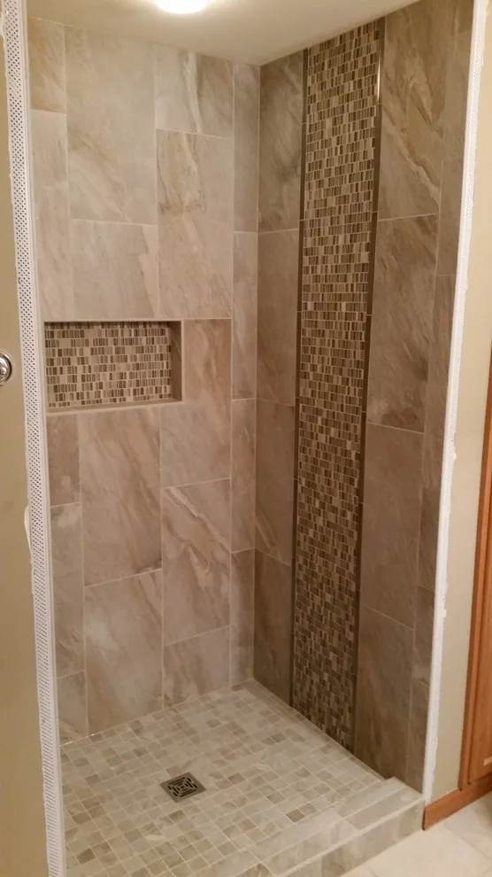 bathing facilities by Heinrichs Custom Tile And Stone - Photo 13