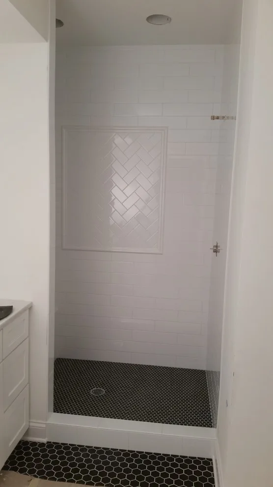 bathing facilities by Heinrichs Custom Tile And Stone - Photo 17