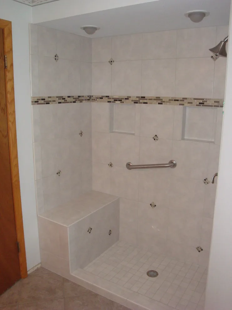 bathing facilities by Heinrichs Custom Tile And Stone - Photo 19