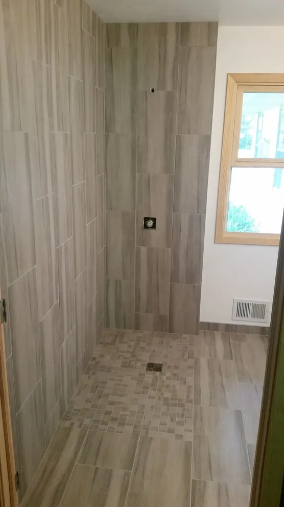 bathing facilities by Heinrichs Custom Tile And Stone - Photo 26