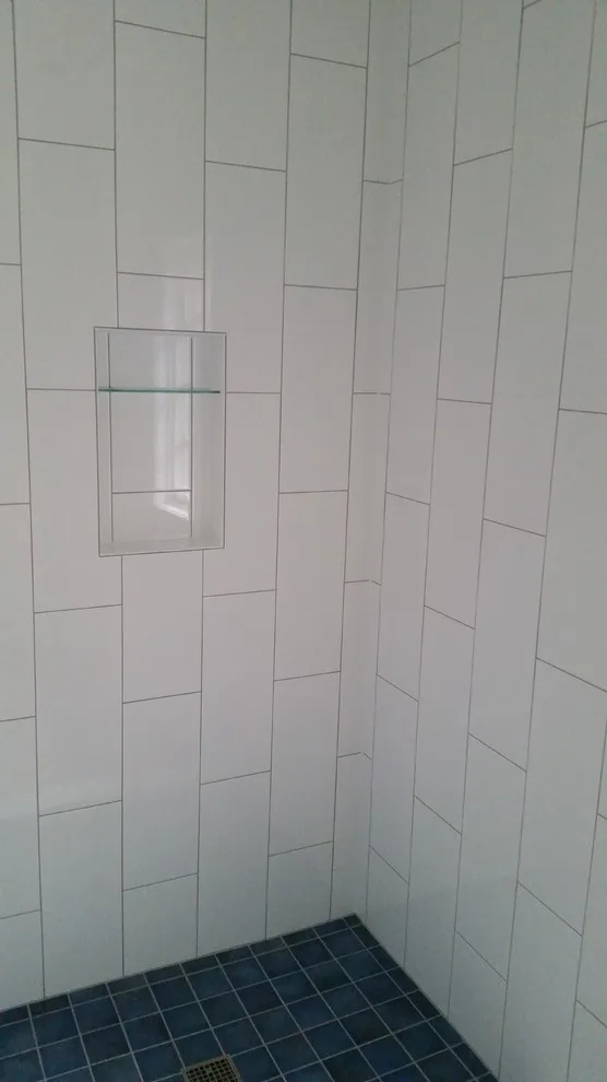 bathing facilities by Heinrichs Custom Tile And Stone - Photo 9