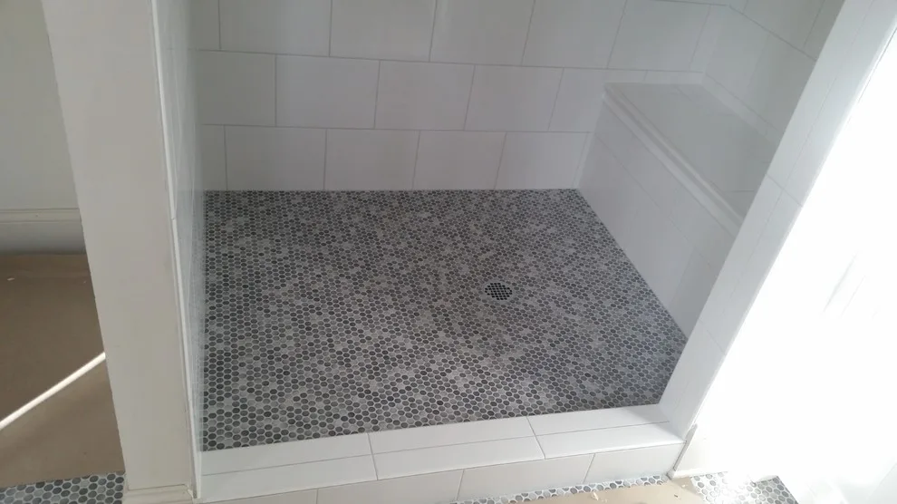 bathing facilities by Heinrichs Custom Tile And Stone - Photo 11