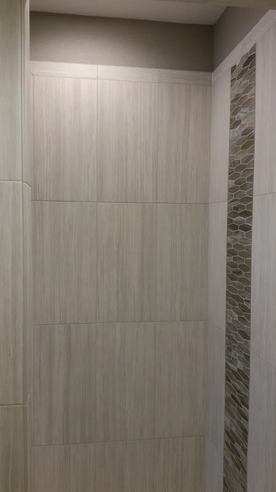 bathing facilities by Heinrichs Custom Tile And Stone - Photo 14