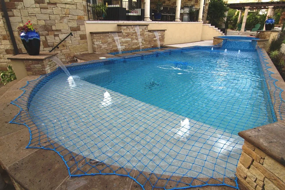 Cantera Stone Exterior Swimming Pool by Rustico Tile & Stone - Photo 2