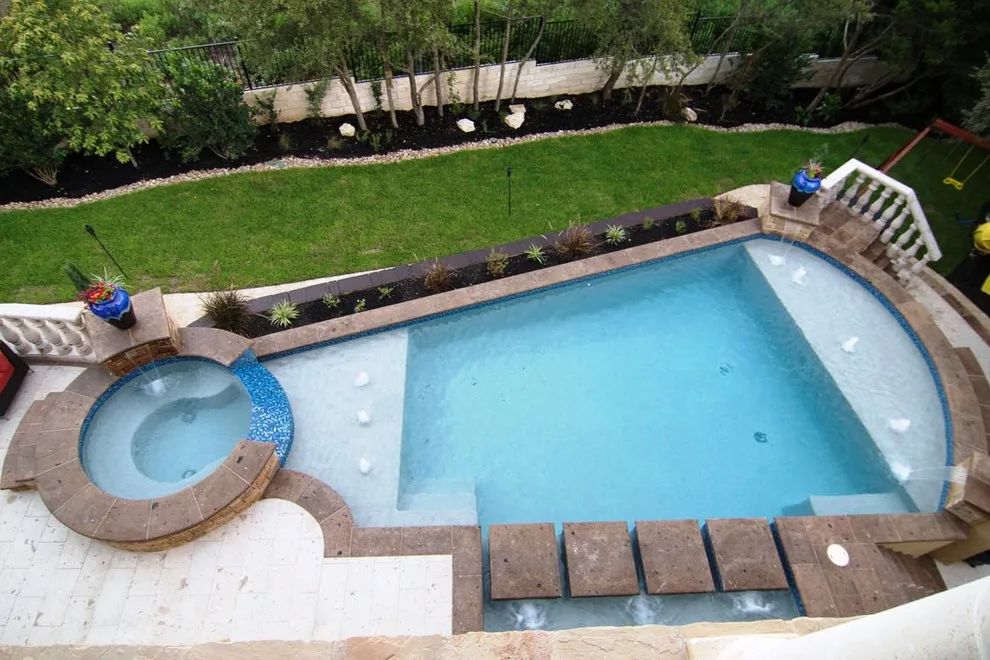 Cantera Stone Exterior Swimming Pool by Rustico Tile & Stone - Photo 3