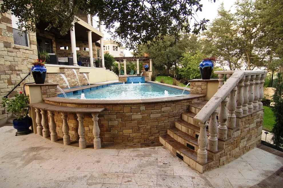 Cantera Stone Exterior Swimming Pool by Rustico Tile & Stone - Photo 5