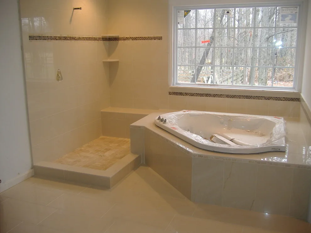 Bespoke Tile and Stone Shower Designs by Elite Showers And Floors - Photo 2