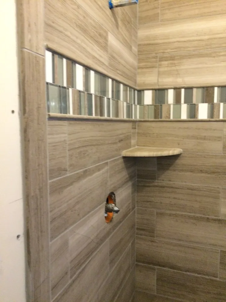Bespoke Tile and Stone Shower Designs by Elite Showers And Floors - Photo 19
