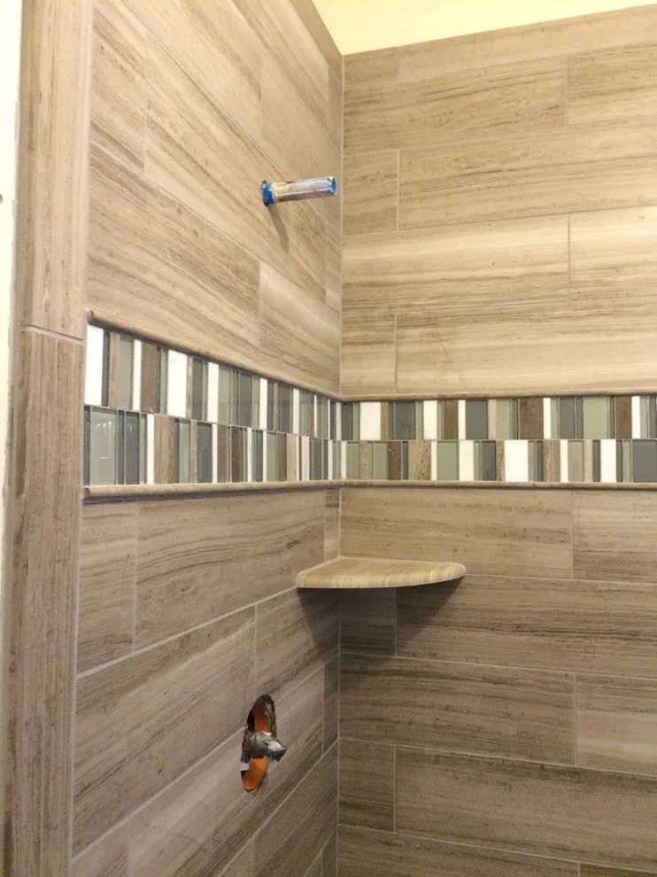 Bespoke Tile and Stone Shower Designs by Elite Showers And Floors - Photo 39