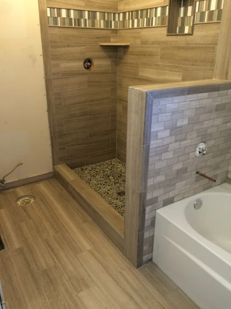 Bespoke Tile and Stone Shower Designs by Elite Showers And Floors - Photo 13