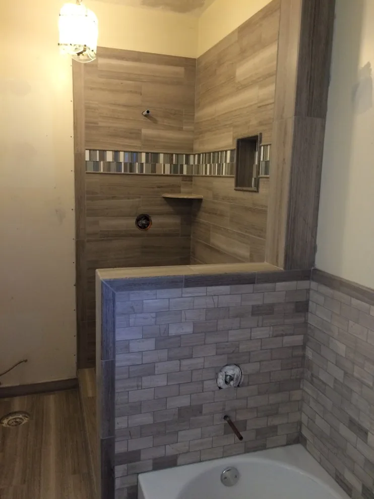 Bespoke Tile and Stone Shower Designs by Elite Showers And Floors - Photo 40