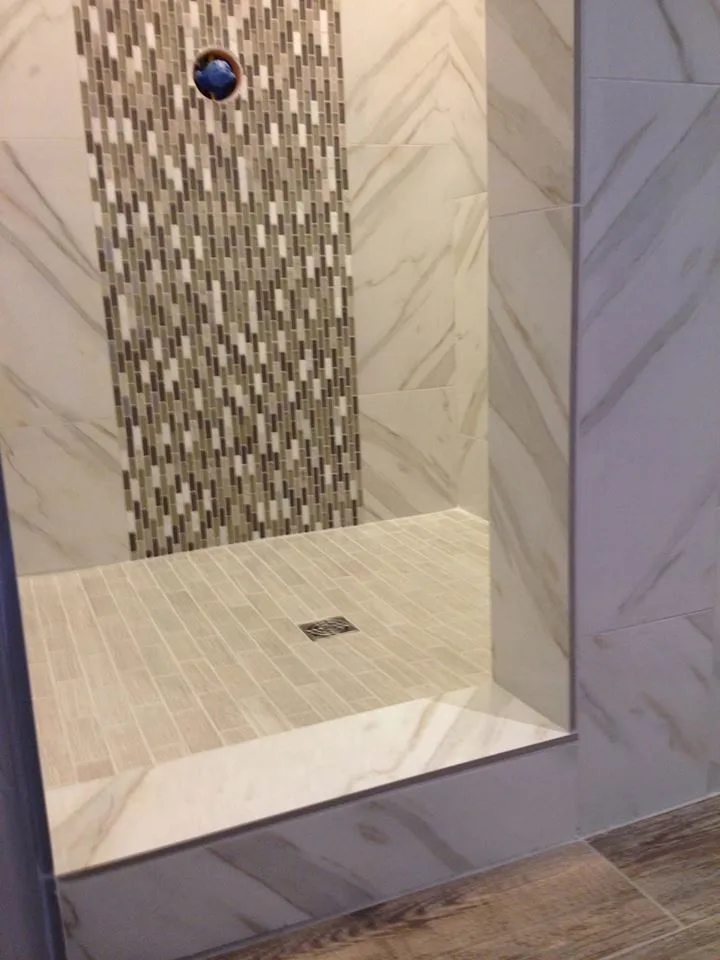 Bespoke Tile and Stone Shower Designs by Elite Showers And Floors - Photo 59