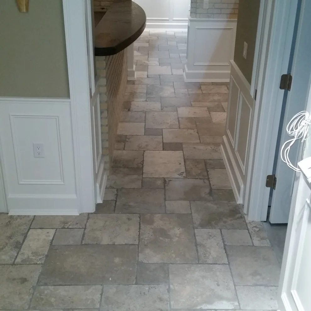 slim brick facade and marble flooring by Heinrichs Custom Tile And Stone - Photo 4