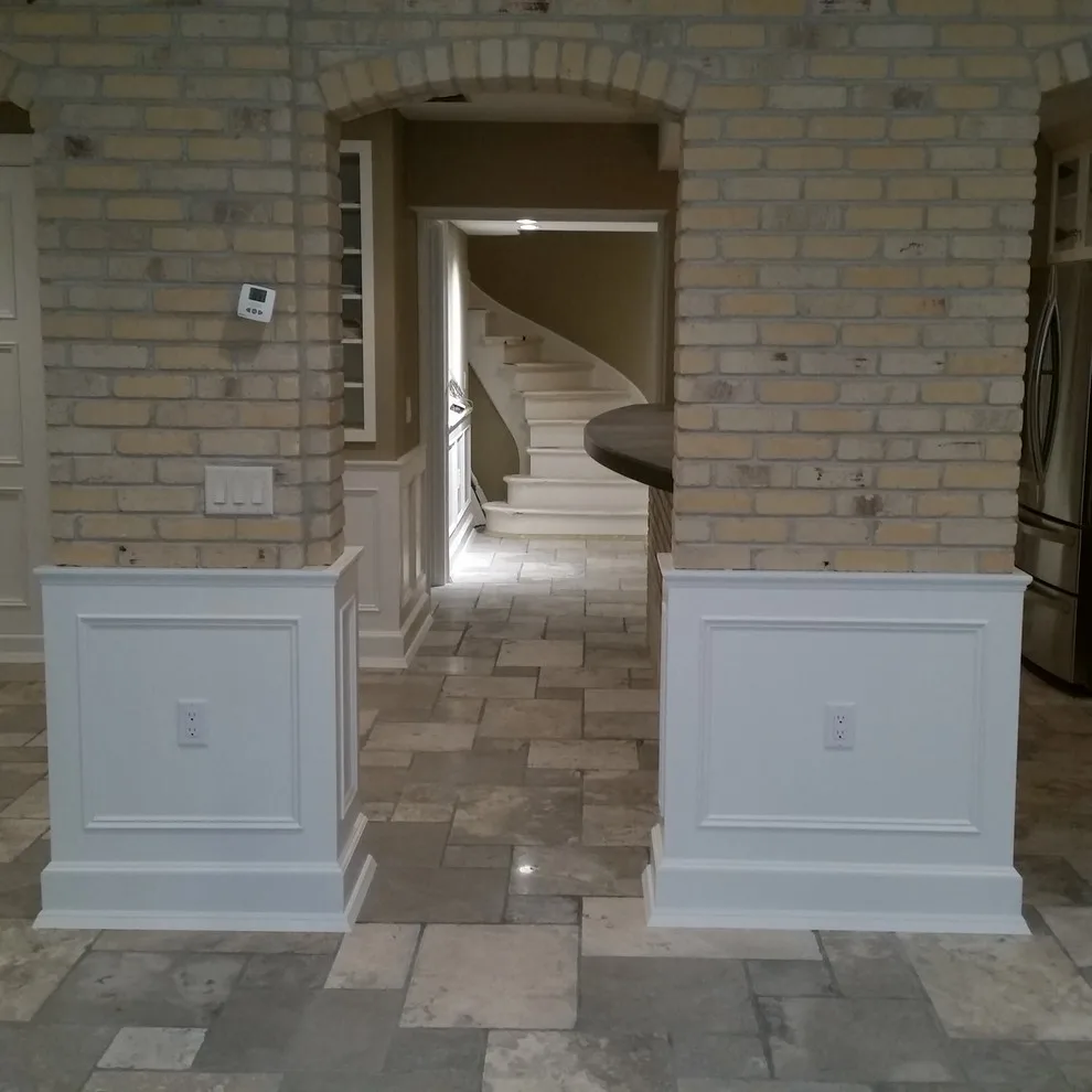 slim brick facade and marble flooring by Heinrichs Custom Tile And Stone - Photo 3