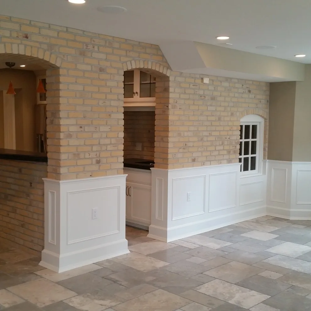 slim brick facade and marble flooring by Heinrichs Custom Tile And Stone - Photo 2