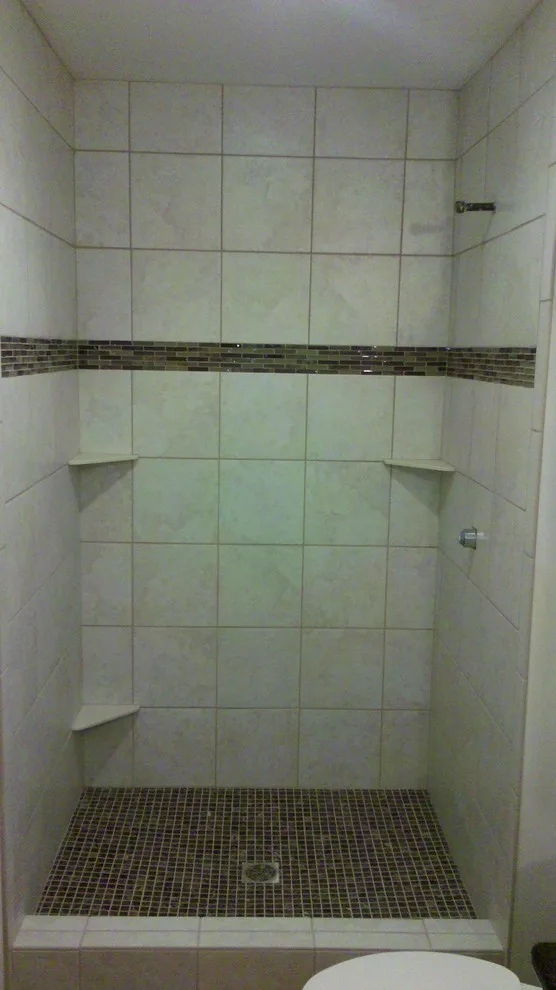 shower with step-in access by Big City Tile & Stone, LLC - Photo 6