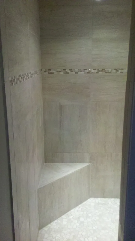 shower with step-in access by Big City Tile & Stone, LLC - Photo 5