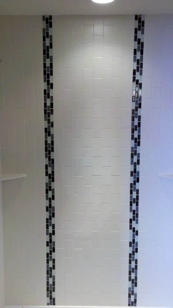 shower with step-in access by Big City Tile & Stone, LLC - Photo 7