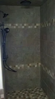 shower with step-in access by Big City Tile & Stone, LLC - Photo 3