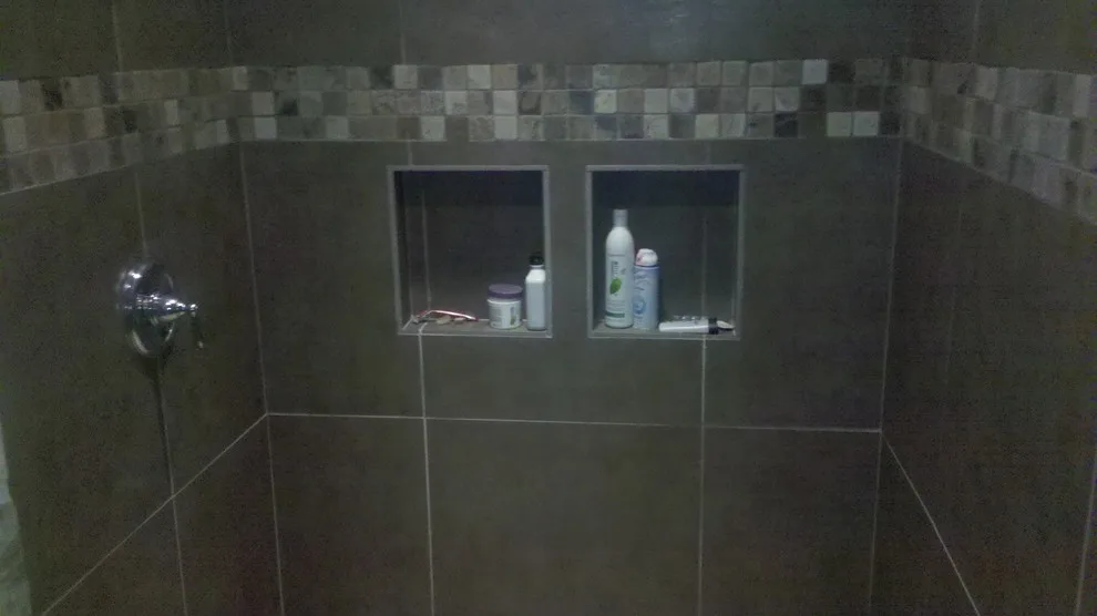 shower with step-in access by Big City Tile & Stone, LLC - Photo 8