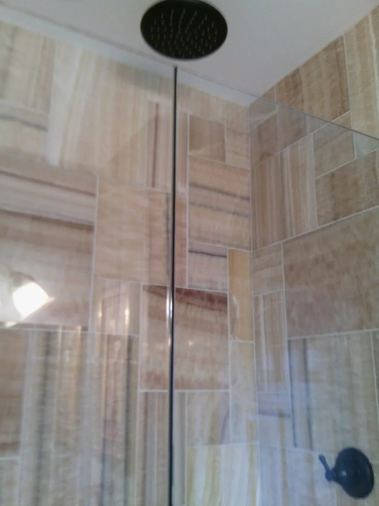 Shower with accessibility by Tic Tac Tile Co. - Photo 5