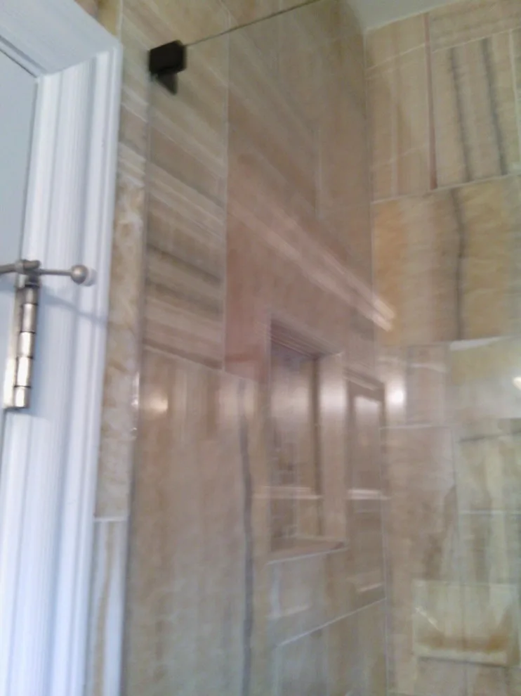 Shower with accessibility by Tic Tac Tile Co. - Photo 16