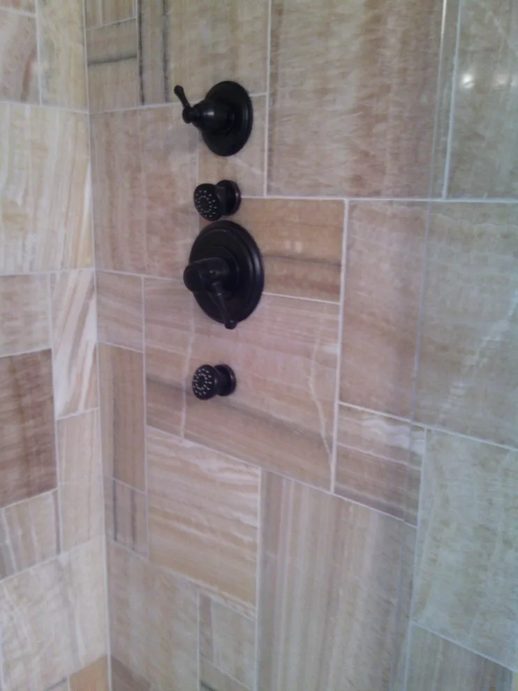Shower with accessibility by Tic Tac Tile Co. - Photo 27