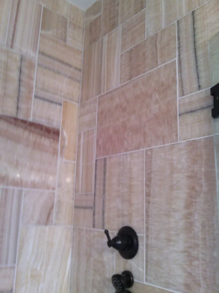 Shower with accessibility by Tic Tac Tile Co. - Photo 9