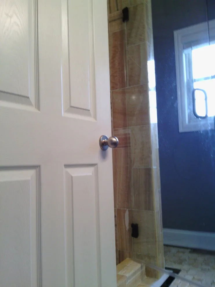 Shower with accessibility by Tic Tac Tile Co. - Photo 25