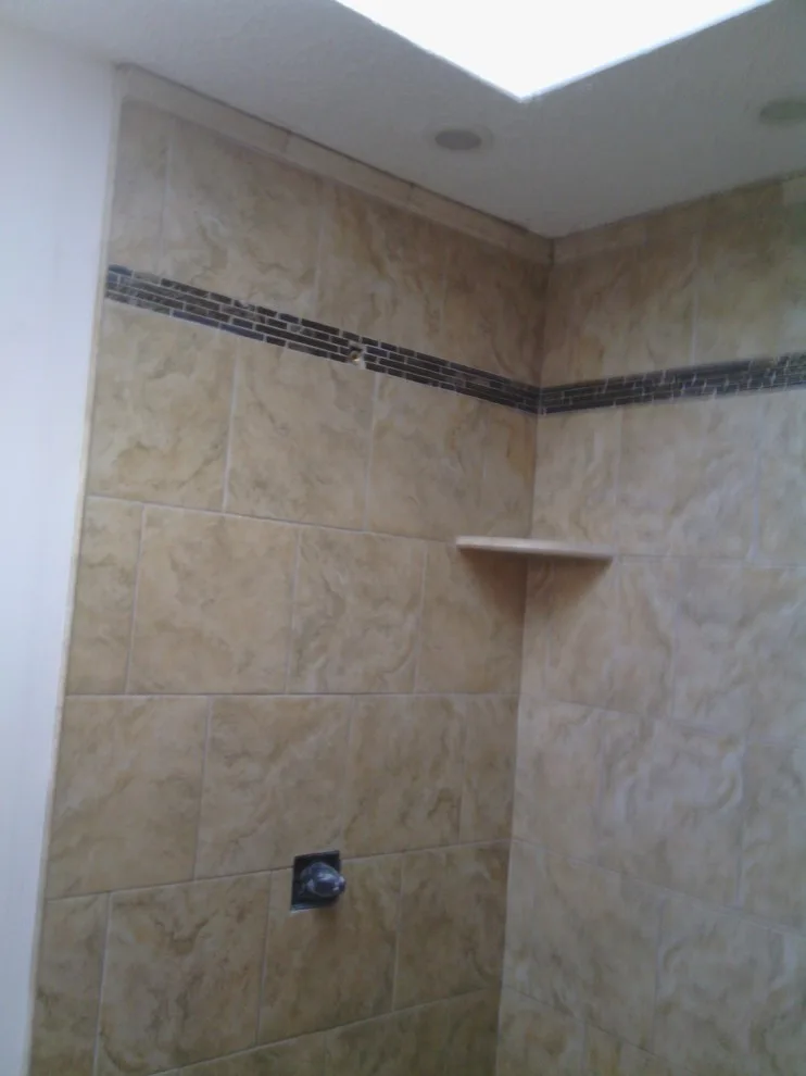 Shower with accessibility by Tic Tac Tile Co. - Photo 24