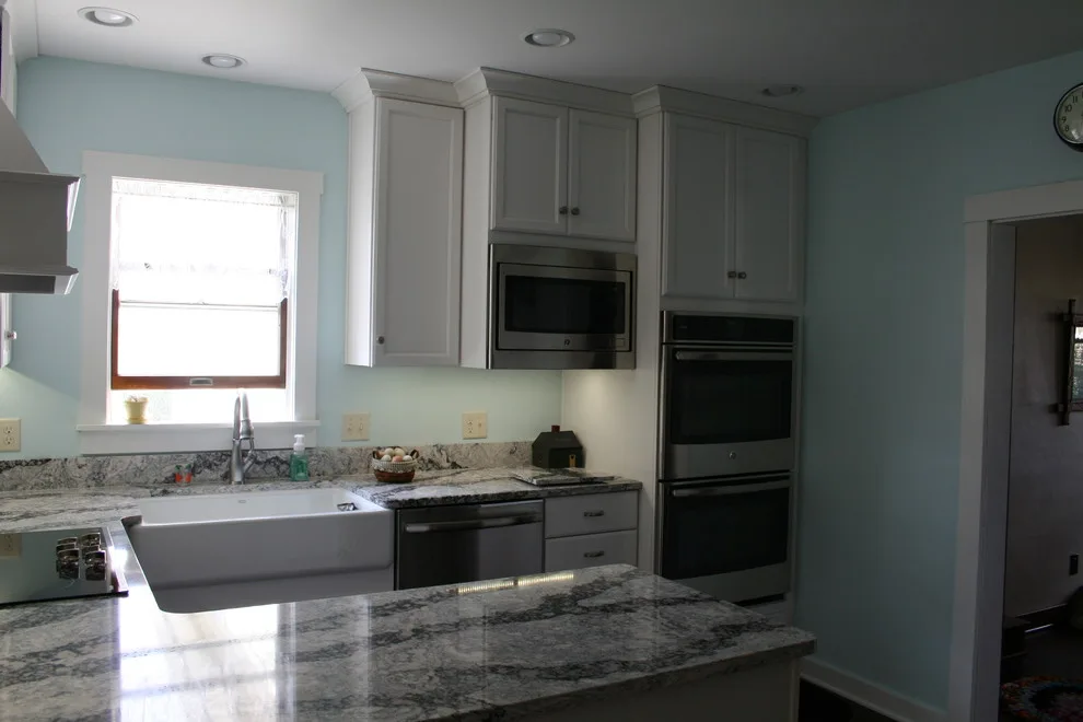 A Transition in Country Kitchen by Kitchens Inc. - Photo 2