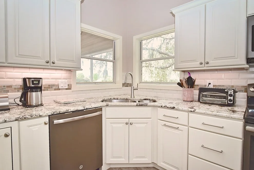 An Elegant Open-Plan Kitchen in Bradenton by Gilbert Design Build - Photo 8