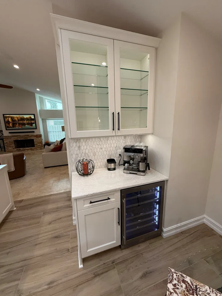 A Beautiful Kitchen Makeover Featuring Timeless White Cabinets by Kitchen Solvers Of The Gulf Coast - Photo 11