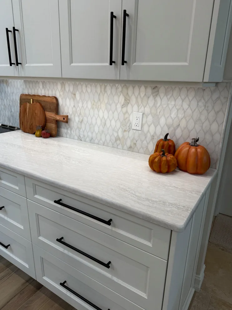 A Beautiful Kitchen Makeover Featuring Timeless White Cabinets by Kitchen Solvers Of The Gulf Coast - Photo 7