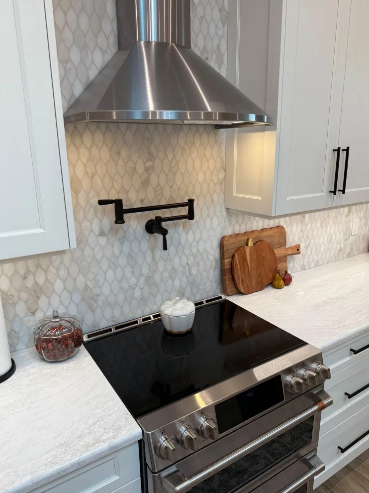 A Beautiful Kitchen Makeover Featuring Timeless White Cabinets by Kitchen Solvers Of The Gulf Coast - Photo 10