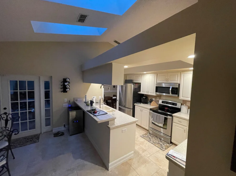 A Beautiful Kitchen Makeover Featuring Timeless White Cabinets by Kitchen Solvers Of The Gulf Coast - Photo 8