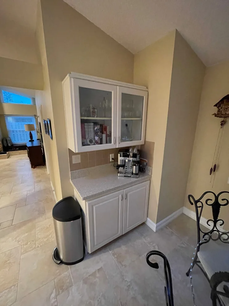 A Beautiful Kitchen Makeover Featuring Timeless White Cabinets by Kitchen Solvers Of The Gulf Coast - Photo 5